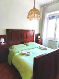 Postel nebo postele na pokoji v ubytování B&B Corallo