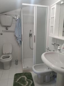 Koupelna v ubytování Artemide Residence Acquaviva