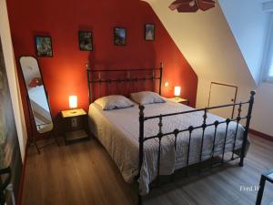 En eller flere senge i et værelse på Pleuca'Dort