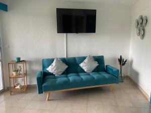 Posezení v ubytování Studio Oiseau du Paradis