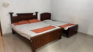 Postel nebo postele na pokoji v ubytování Colombo view inn
