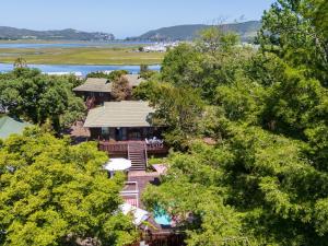 an aerial view of a house with trees at Knysna Lagoon - Lakeview Haven Chalet in Knysna