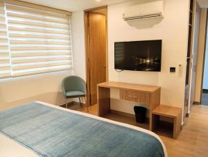 TV a/nebo společenská místnost v ubytování Hotel Lomas 10 Medellin