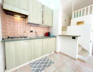 Kuchyň nebo kuchyňský kout v ubytování Confortevole Appartamento Nel Centro Storico