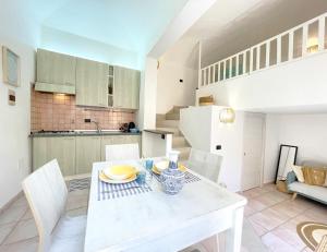 Kuchyň nebo kuchyňský kout v ubytování Confortevole Appartamento Nel Centro Storico