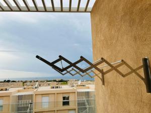 En balkong eller terrasse på Azure Nest - Sea View Duplex with Golf and Pool Access in Taghazout Bay