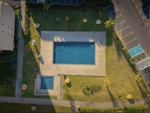Bassenget på eller i nærheten av Azure Nest - Sea View Duplex with Golf and Pool Access in Taghazout Bay