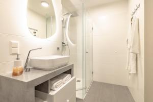 Koupelna v ubytování EA- Design Apartment nähe Hauptplatz