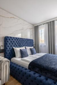Postel nebo postele na pokoji v ubytování EA- Design Apartment nähe Hauptplatz