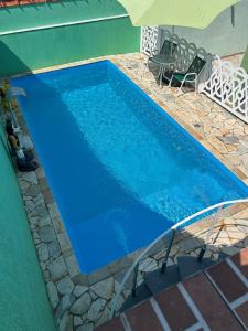 Swimmingpoolen hos eller tæt på Casa em Itanhaém