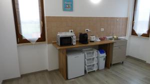 Kuchyň nebo kuchyňský kout v ubytování Podere Monfalcone guest house