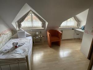 Postel nebo postele na pokoji v ubytování Hotel Friesengeist