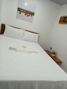 Postel nebo postele na pokoji v ubytování El Cairo Hotel