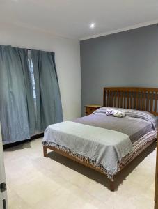 Ένα ή περισσότερα κρεβάτια σε δωμάτιο στο Casa Apacheta