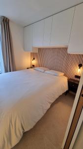 Postel nebo postele na pokoji v ubytování Appartement Manieldi - Golfe de St-Tropez