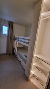 Postel nebo postele na pokoji v ubytování Appartement Manieldi - Golfe de St-Tropez