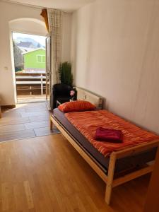 Postel nebo postele na pokoji v ubytování Ferienwohnung Dippoldiswalde