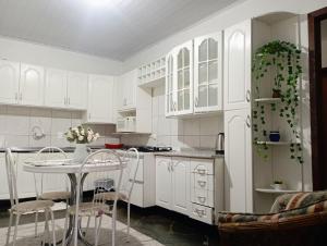 Kuchyň nebo kuchyňský kout v ubytování Espaço inteiro - LOFT confortavel + 22 fotografií