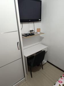 TV a/nebo společenská místnost v ubytování Espaço inteiro - LOFT confortavel