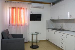 Kuchyň nebo kuchyňský kout v ubytování Hotel Blu Mare