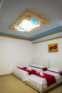 Postel nebo postele na pokoji v ubytování Hotel Blu Mare
