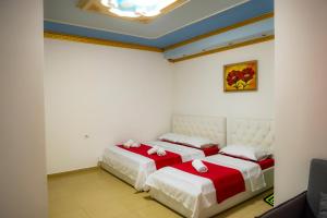 Postel nebo postele na pokoji v ubytování Hotel Blu Mare