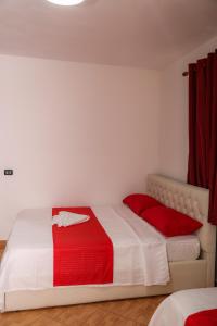 Postel nebo postele na pokoji v ubytování Hotel Blu Mare