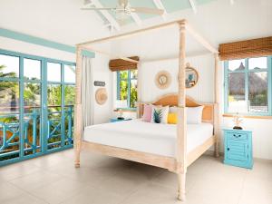 Postel nebo postele na pokoji v ubytování Boardwalk Boutique Hotel Aruba - Adults Only + 37 fotografií
