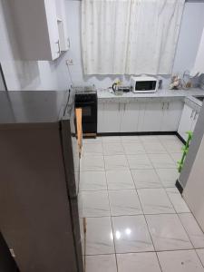 Kuchyň nebo kuchyňský kout v ubytování D8 at Guoji Complex