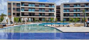 Πισίνα στο ή κοντά στο Refúgio By Paty - Malia Beach Studio Porto de Galinhas Muro Alto - Família