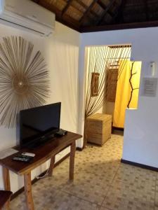 Televiisor ja/või meelelahutuskeskus majutusasutuses Pousada Duna Paraiso Maceió