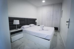 Postel nebo postele na pokoji v ubytování Apartamento Pôr do Sol