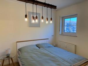 Postel nebo postele na pokoji v ubytování Haus am Weinberg + 11 fotografií