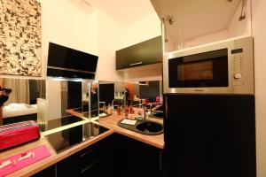 Кухня или мини-кухня в Rouen centre - Espace Privé Rouen - Spa
 +37 фотографий