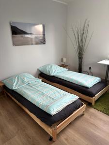 Postel nebo postele na pokoji v ubytování Ferienwohnung komham