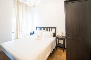 Postel nebo postele na pokoji v ubytování L'Oliveto dei Cinque Sensi
