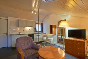 Kuchyň nebo kuchyňský kout v ubytování Hotel Hine Adon Fribourg