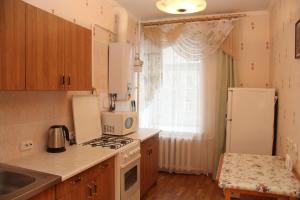 
Кухня или мини-кухня в PiterFlat - Апартаменты Черняховского 67
