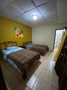 Postel nebo postele na pokoji v ubytování Hostal Beiro