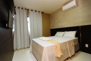 Katil atau katil-katil dalam bilik di Vilage paradise +29 gambar