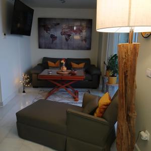 Posedenie v ubytovaní ***** ATTIC WITH IMPRESSIVE VIEWS AND JACUZZI