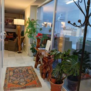 Posedenie v ubytovaní ***** ATTIC WITH IMPRESSIVE VIEWS AND JACUZZI