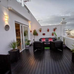 Posedenie v ubytovaní ***** ATTIC WITH IMPRESSIVE VIEWS AND JACUZZI