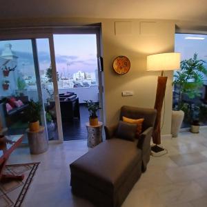 Posedenie v ubytovaní ***** ATTIC WITH IMPRESSIVE VIEWS AND JACUZZI