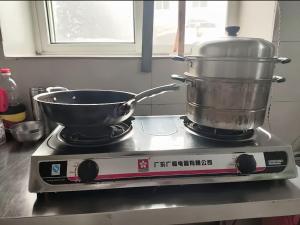 Eldhús eða eldhúskrókur á 中国山东青岛崂山雕龙嘴农家院