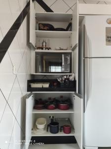 Kuchyň nebo kuchyňský kout v ubytování Casa Térrea 3 quartos, sendo 1 suíte Maringá