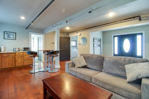 a living room with a couch and a table at Sisters Retreat Upper Lower in Sisters