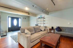a living room with a couch and a table at Sisters Retreat Upper Lower in Sisters