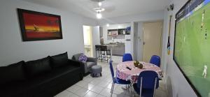 Khu vực ghế ngồi tại Jardim das Thermas apt para até 5 pessoas