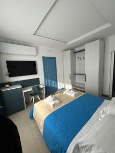 Postel nebo postele na pokoji v ubytování B&B Naiadi Anzio